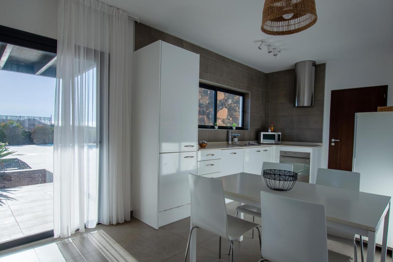 Heated & Shared Pool Villa Matriana 36B, North Shore Villas Ла Олива Екстериор снимка