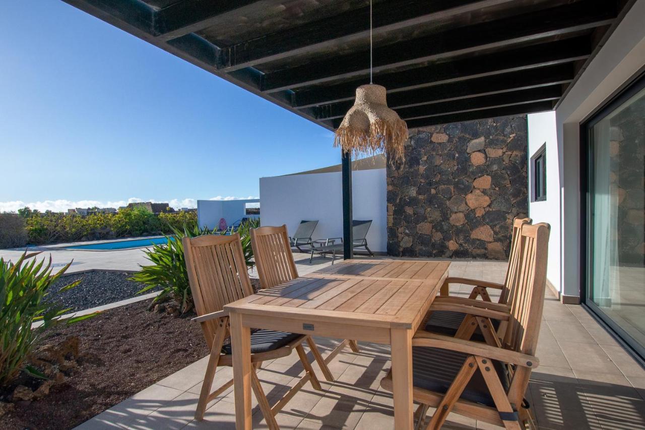 Heated & Shared Pool Villa Matriana 36B, North Shore Villas Ла Олива Екстериор снимка